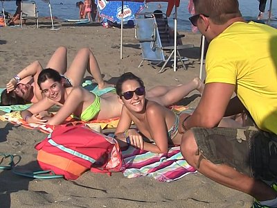 Spanish chicks seduced on a beach